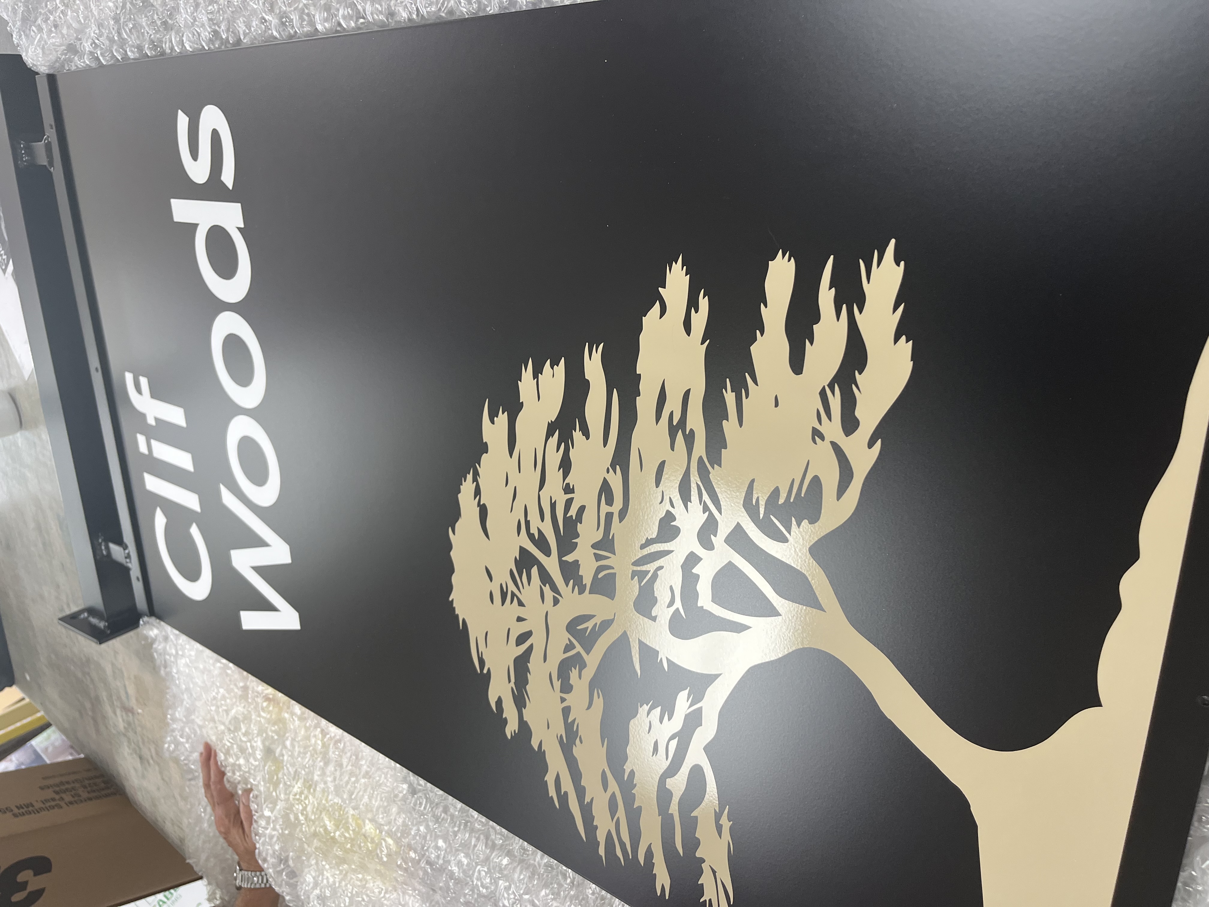 Clif Woods business sign