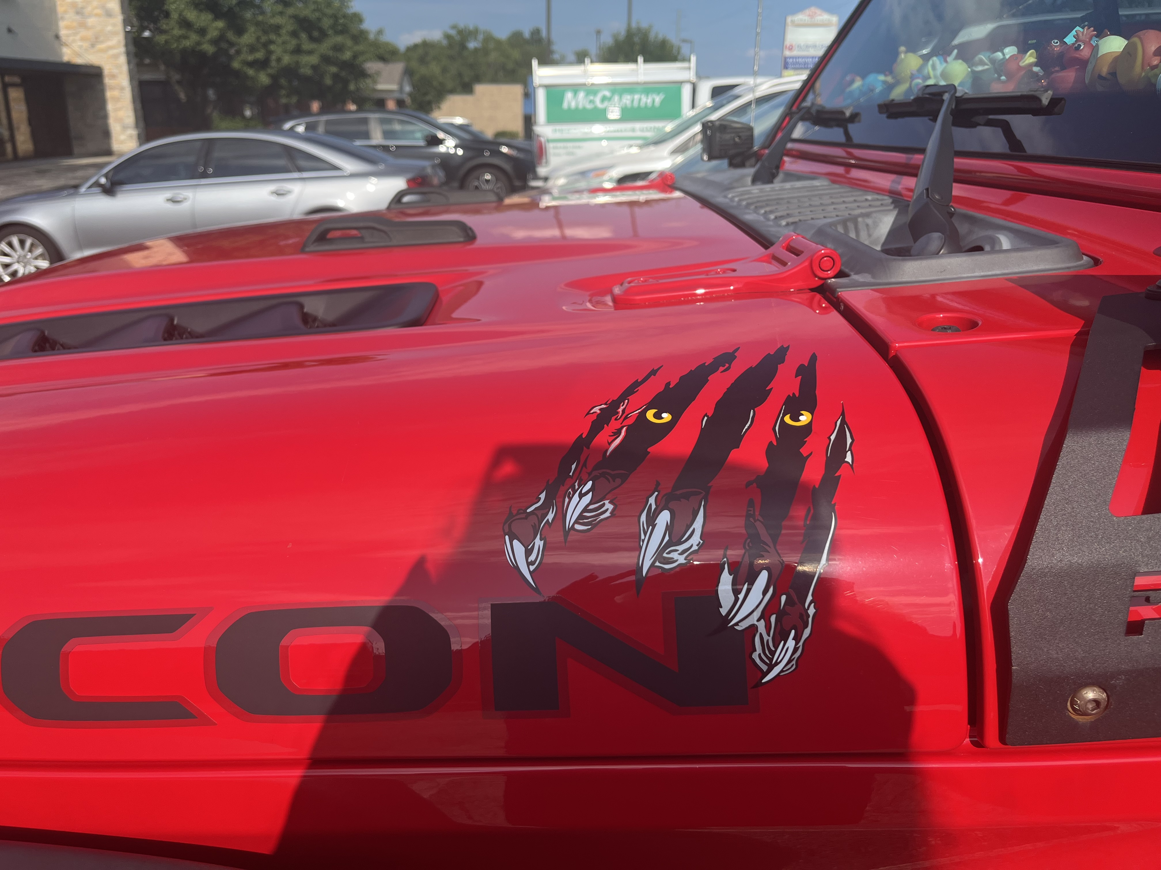 Red vehicle with professional lettering